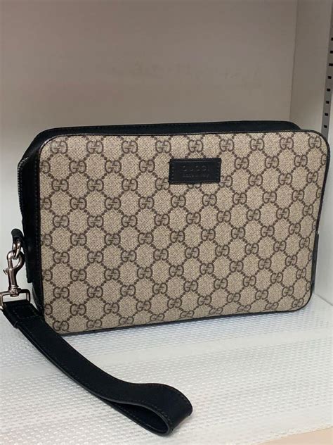 gucci clutch bag fake|gucci clutch bag for men.